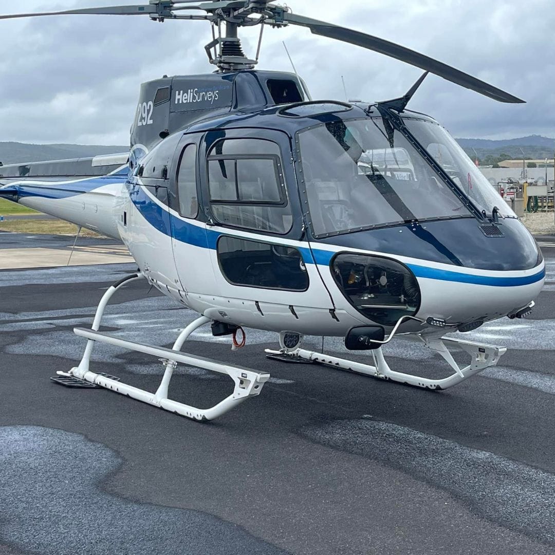 white-blue-helicopter-image img-11